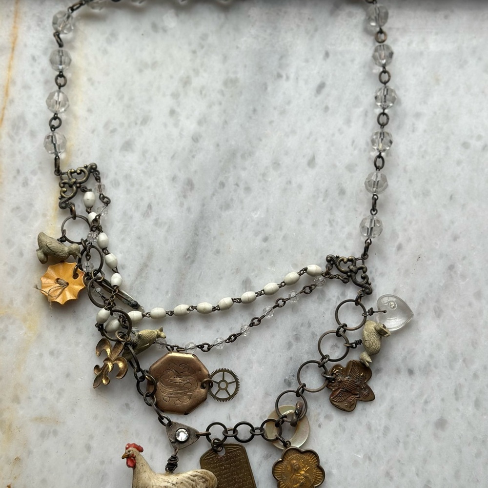 Eclectic Gold and Silver Necklace with Charms and Beads